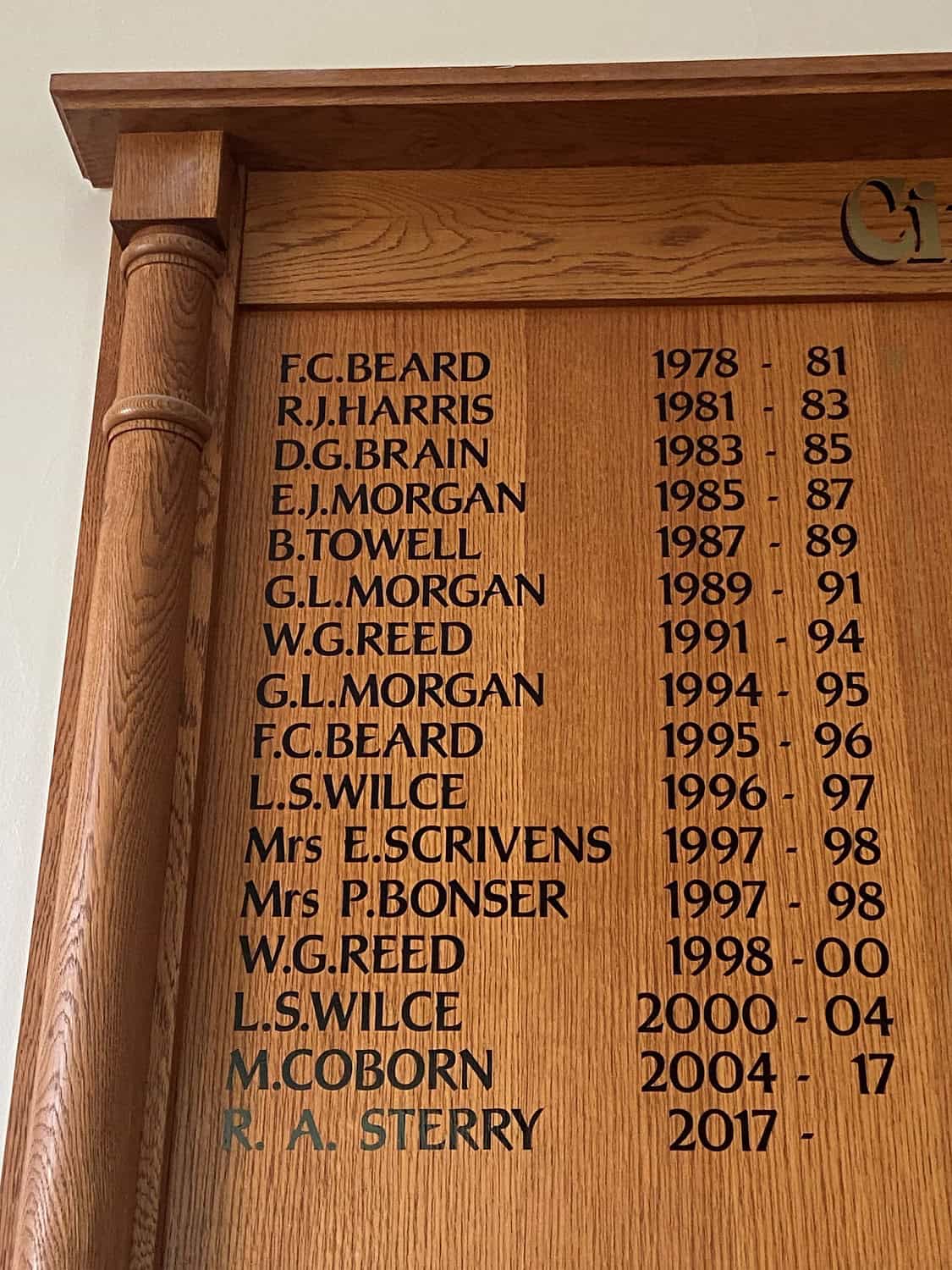 A wooden honors board lists names and years from 1978 to 2017, including F.C. Beard, R.J. Harris, D.G. Brain, E.J. Morgan, B. Towell, G.L. Morgan, W.G. Reed, L.S. Wilce, P. Bonser, M. Coborn, and R.A. Sterry.